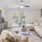 a living room with a couch and a table