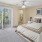 a bedroom with a large bed