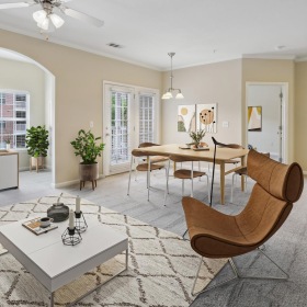 All the comforts of luxury living a large living room with a large window