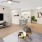a living room with a tv and couches