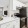 a kitchen with white cabinets