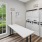 a room with white cabinets and a table